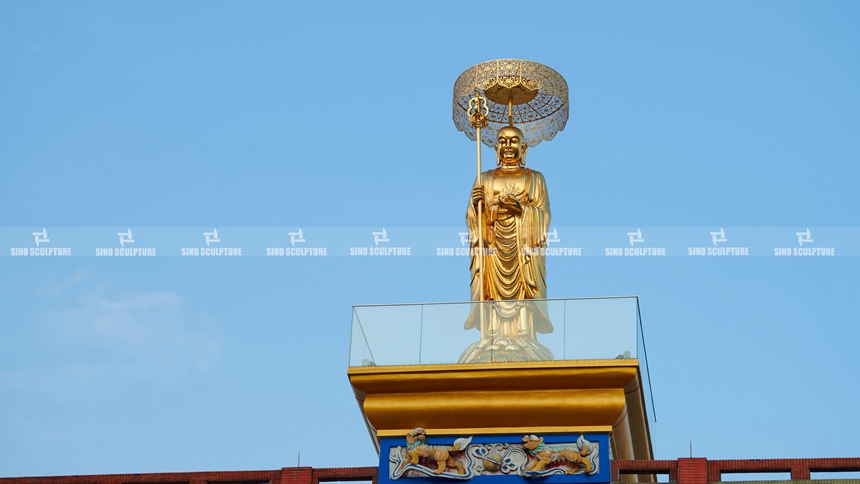 Gold leaf Bronze Ksitigarbha Buddha sculpture., Singapore 